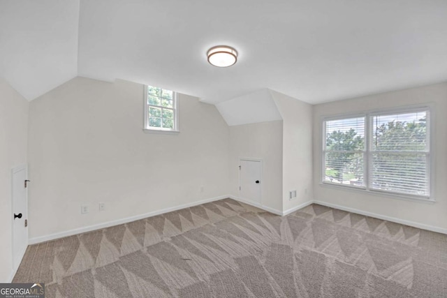 3451 Falls Branch Ct, Buford, GA 30519 - bonus room featuring lofted ceiling, carpet, and baseboards