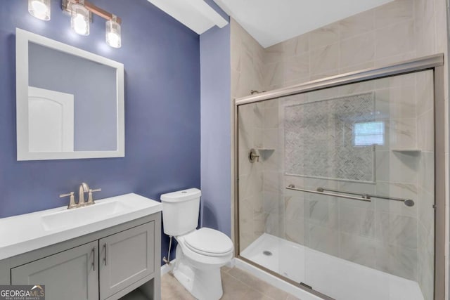 3451 Falls Branch Ct, Buford, GA 30519 - bathroom featuring toilet, a stall shower, vanity, and tile patterned flooring