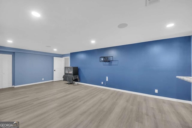 3451 Falls Branch Ct, Buford, GA 30519 - unfurnished living room with wood finished floors, recessed lighting, and baseboards