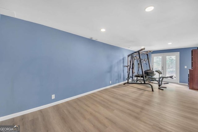 3451 Falls Branch Ct, Buford, GA 30519 - workout area featuring french doors, wood finished floors, baseboards, and recessed lighting