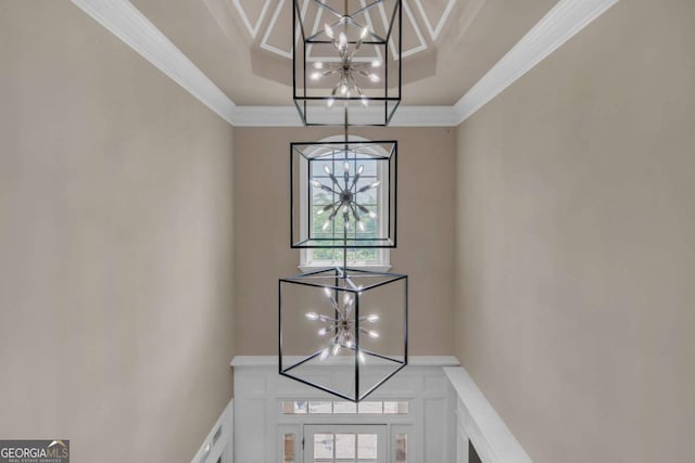3451 Falls Branch Ct, Buford, GA 30519 - detailed view of a chandelier, ornamental molding, and a decorative wall