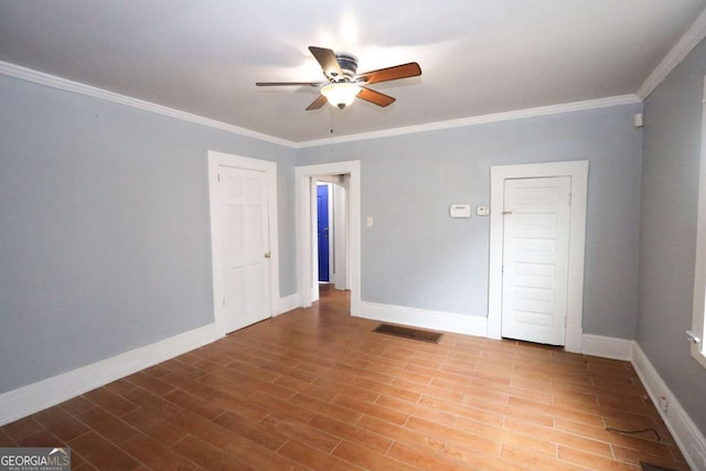 1852 E Farris Ave, Atlanta, GA 30344 - unfurnished room with ceiling fan, baseboards, crown molding, and wood finished floors