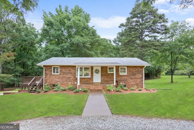 764 Sandy Cross Rd, Lexington, GA 30648 - ranch-style home featuring a front yard, brick siding, and a wooden deck