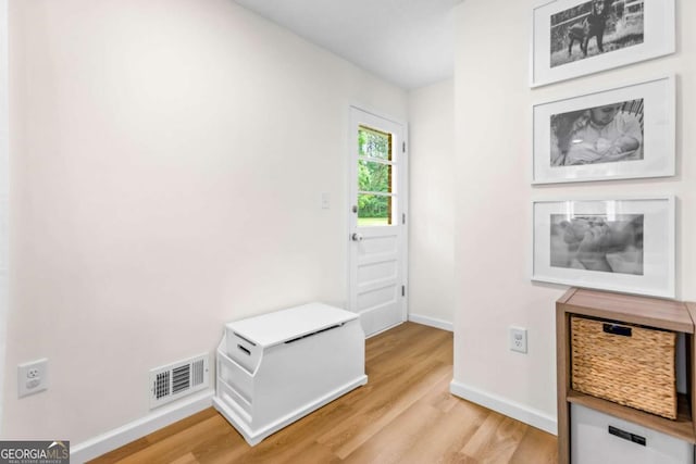 764 Sandy Cross Rd, Lexington, GA 30648 - doorway to outside with light wood-style flooring and baseboards