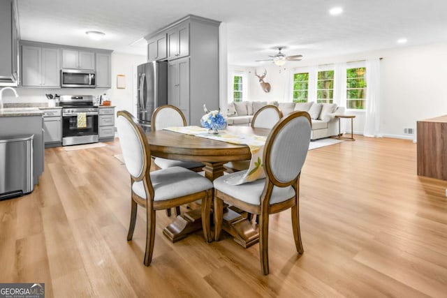 764 Sandy Cross Rd, Lexington, GA 30648 - dining space featuring light wood finished floors, a ceiling fan, and recessed lighting