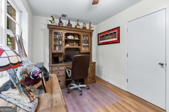 764 Sandy Cross Rd, Lexington, GA 30648 - home office featuring light wood-style flooring and ceiling fan