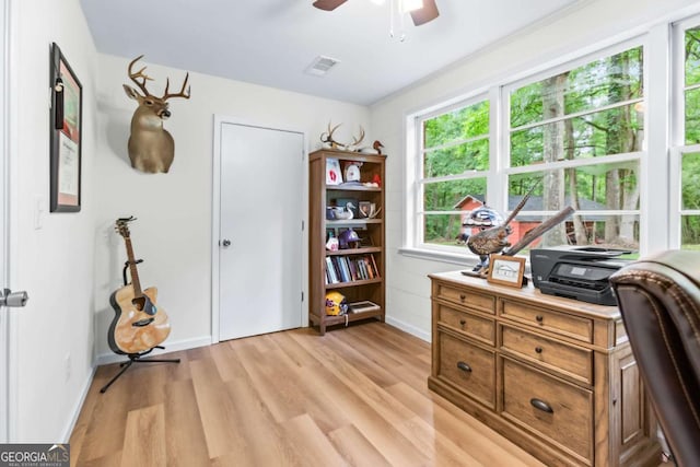 764 Sandy Cross Rd, Lexington, GA 30648 - home office featuring light wood-style flooring and ceiling fan