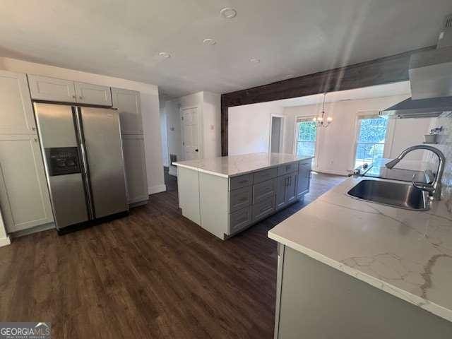 2000 Brickton Sta, Buford, GA 30518 - kitchen featuring stainless steel refrigerator with ice dispenser, a sink, gray cabinetry, dark wood-style floors, and a kitchen island