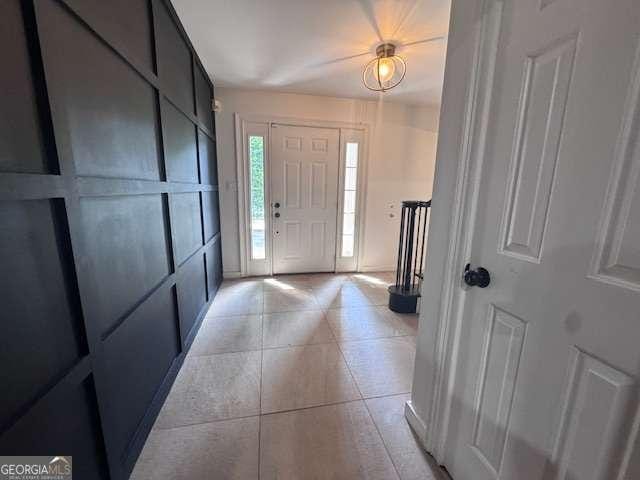 2000 Brickton Sta, Buford, GA 30518 - foyer entrance with light tile patterned floors and baseboards