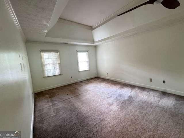 2000 Brickton Sta, Buford, GA 30518 - carpeted spare room with baseboards, ornamental molding, and a raised ceiling