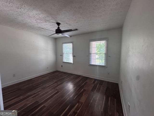 2000 Brickton Sta, Buford, GA 30518 - empty room with wood finished floors, a ceiling fan, baseboards, and a textured ceiling