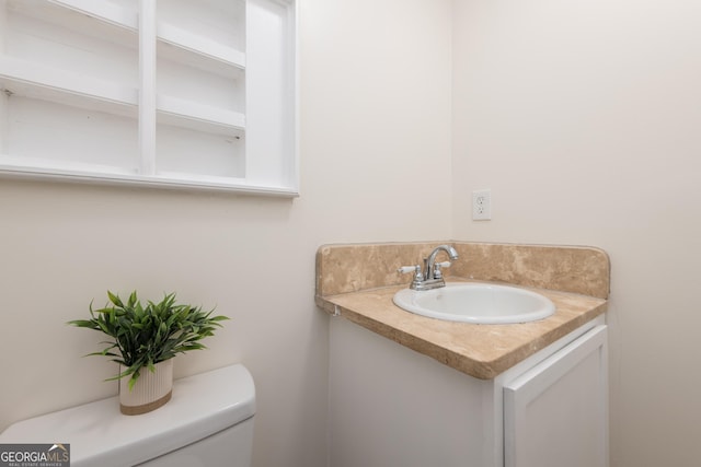 139 Old Oak Rd, Byron, GA 31008 - half bathroom featuring toilet and vanity