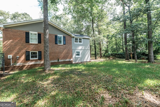 139 Old Oak Rd, Byron, GA 31008 - view of side of property featuring a yard and brick siding