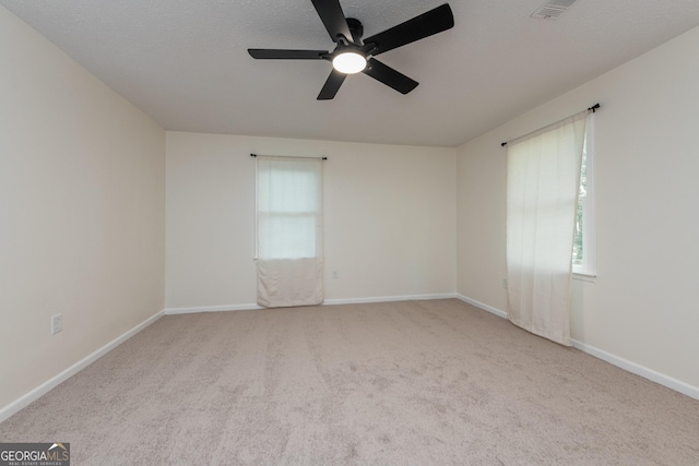 139 Old Oak Rd, Byron, GA 31008 - carpeted empty room with ceiling fan, plenty of natural light, and baseboards