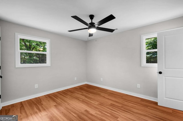162 Langston Rd NE, Calhoun, GA 30701 - spare room featuring light wood finished floors, baseboards, and ceiling fan