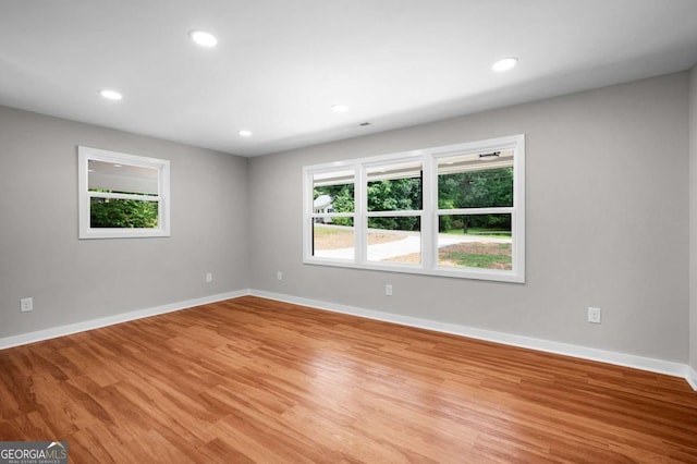 162 Langston Rd NE, Calhoun, GA 30701 - unfurnished room featuring light wood finished floors, plenty of natural light, baseboards, and recessed lighting
