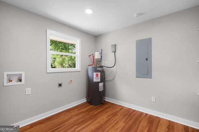 162 Langston Rd NE, Calhoun, GA 30701 - laundry area with electric panel, water heater, hookup for an electric dryer, washer hookup, and baseboards