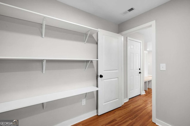 162 Langston Rd NE, Calhoun, GA 30701 - spacious closet featuring wood finished floors
