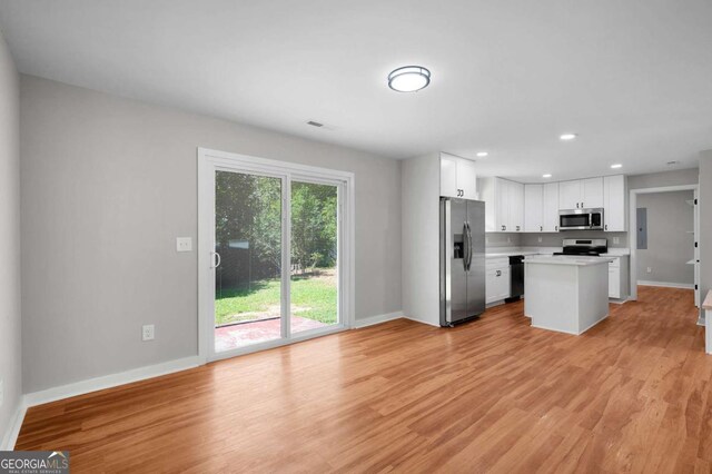 162 Langston Rd NE, Calhoun, GA 30701 - kitchen with appliances with stainless steel finishes, light countertops, baseboards, light wood-style floors, and recessed lighting
