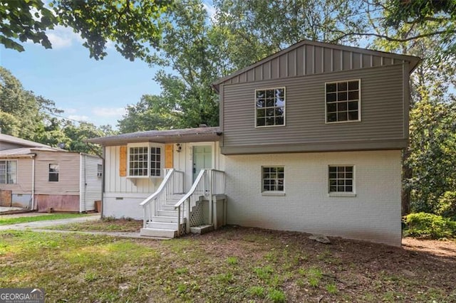 6192 Holiday Blvd, Forest Park, GA 30297 - split level home with board and batten siding and brick siding