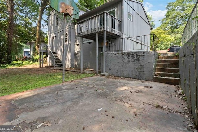 6192 Holiday Blvd, Forest Park, GA 30297 - back of house featuring stairs and a wooden deck