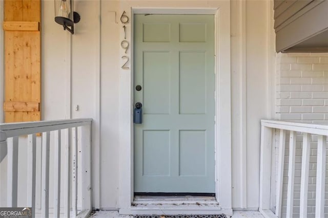 6192 Holiday Blvd, Forest Park, GA 30297 - doorway to property featuring board and batten siding