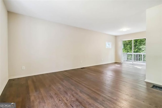 6192 Holiday Blvd, Forest Park, GA 30297 - unfurnished room featuring wood finished floors and baseboards