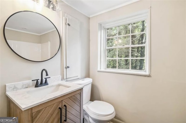 6192 Holiday Blvd, Forest Park, GA 30297 - bathroom featuring healthy amount of natural light, vanity, and ornamental molding