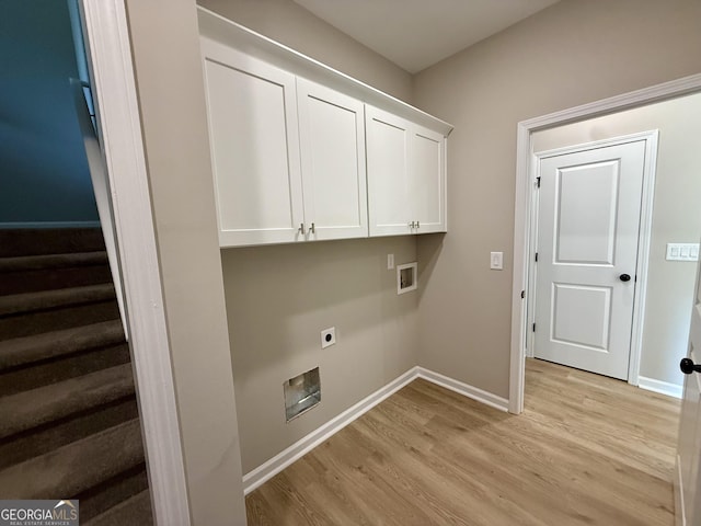 143 Roberts Quarters Rd, Concord, GA 30206 - laundry area with electric dryer hookup, light wood-type flooring, cabinet space, baseboards, and washer hookup
