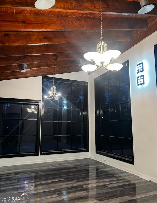 782 Wimbish Rd, Macon, GA 31210 - detailed view of a chandelier, wood finished floors, wooden ceiling with exposed beams, and baseboards