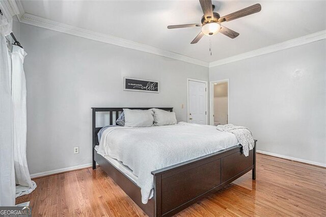 83 Shipp, Hiram, GA 30141 - bedroom with light wood-style flooring, crown molding, and ceiling fan