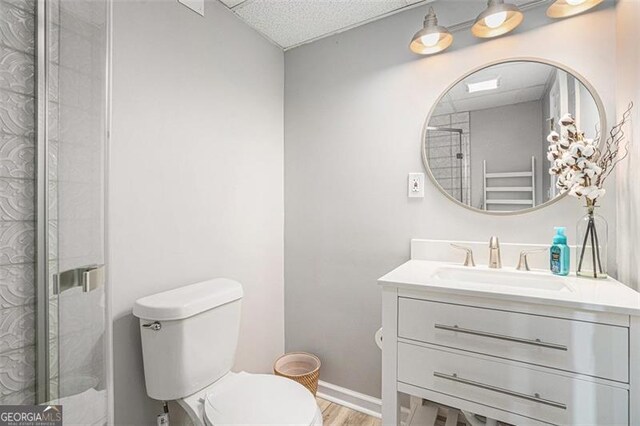 83 Shipp, Hiram, GA 30141 - workout area featuring wood finished floors, a paneled ceiling, and recessed lighting