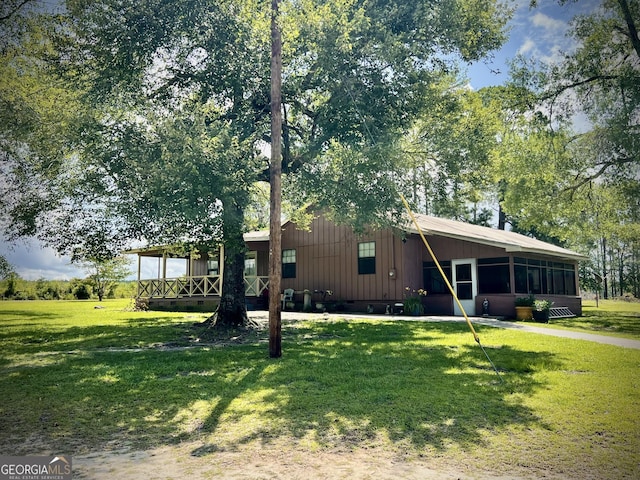 2618 Ga Highway 86, Adrian, GA 31002 - view of front of home with a front yard and board and batten siding