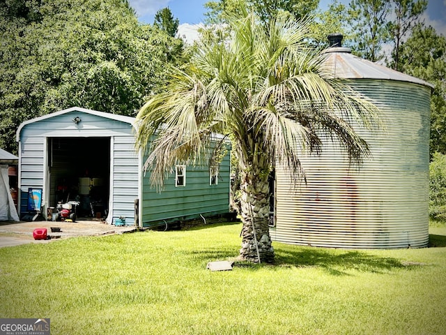 2618 Ga Highway 86, Adrian, GA 31002 - view of home's exterior with an outbuilding and a yard