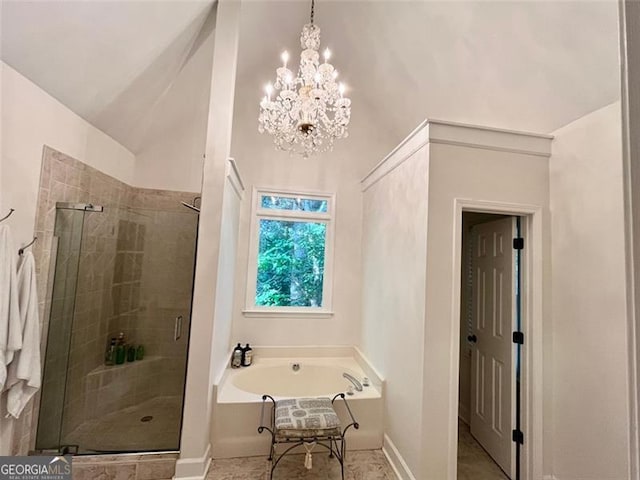 8525 Anchor On Lanier Ct, Gainesville, GA 30506 - bathroom with a garden tub, a shower stall, baseboards, and a chandelier