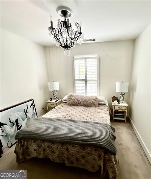 8525 Anchor On Lanier Ct, Gainesville, GA 30506 - bedroom with a chandelier, light carpet, and baseboards