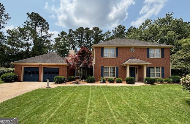 404 Windsor Way, Peachtree City, GA 30269 - colonial home featuring an attached garage, driveway, a front lawn, brick siding, and a chimney