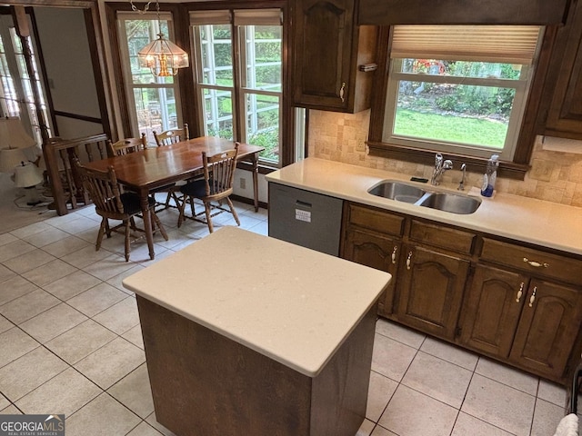404 Windsor Way, Peachtree City, GA 30269 - kitchen with plenty of natural light, light countertops, light tile patterned floors, and a sink