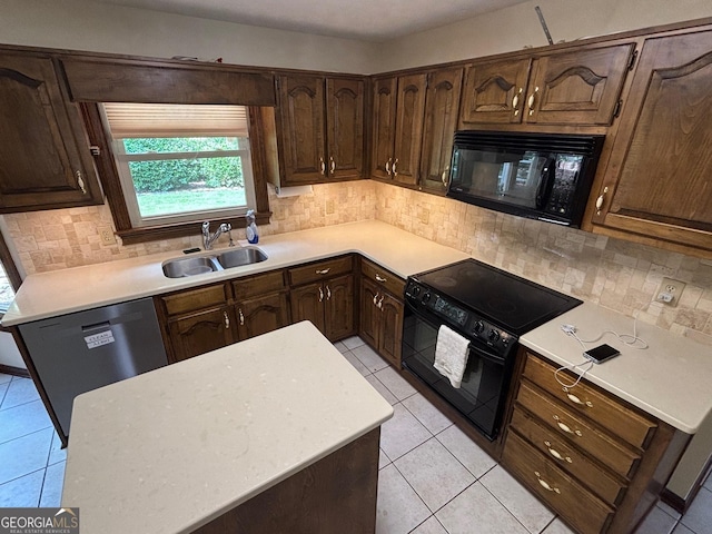 404 Windsor Way, Peachtree City, GA 30269 - kitchen featuring black appliances, a sink, light tile patterned flooring, and light countertops