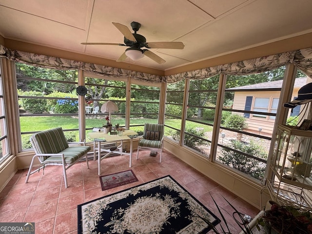 404 Windsor Way, Peachtree City, GA 30269 - sunroom featuring a ceiling fan, baseboards, and tile patterned flooring
