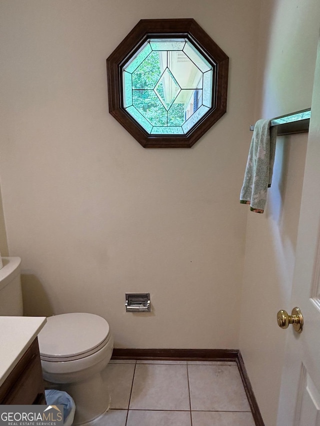 404 Windsor Way, Peachtree City, GA 30269 - bathroom featuring toilet, tile patterned floors, vanity, and baseboards