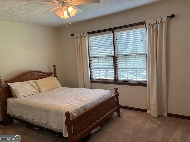 404 Windsor Way, Peachtree City, GA 30269 - bedroom with baseboards, carpet flooring, a textured ceiling, and a ceiling fan