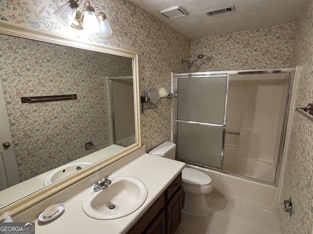 404 Windsor Way, Peachtree City, GA 30269 - bathroom with vanity, toilet, wallpapered walls, bath / shower combo with glass door, and tile patterned floors
