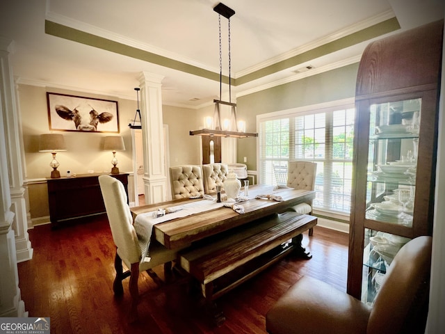 511 Live Oak Way, Dublin, GA 31021 - dining space with ornate columns, dark wood-type flooring, and ornamental molding
