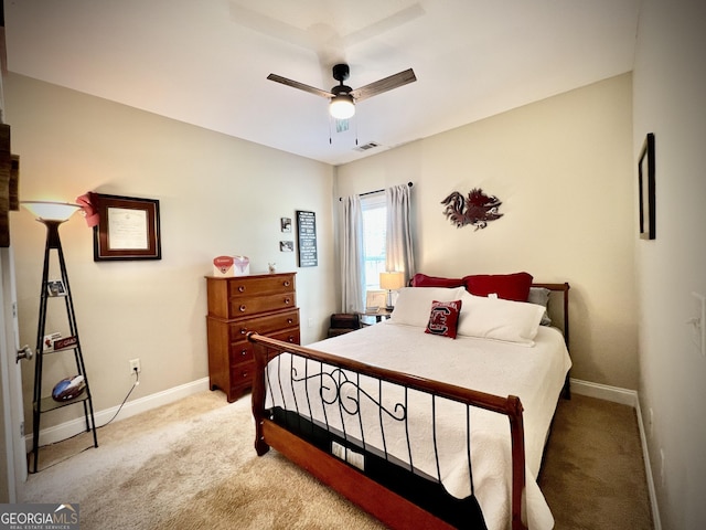 511 Live Oak Way, Dublin, GA 31021 - bedroom featuring light carpet, baseboards, and a ceiling fan