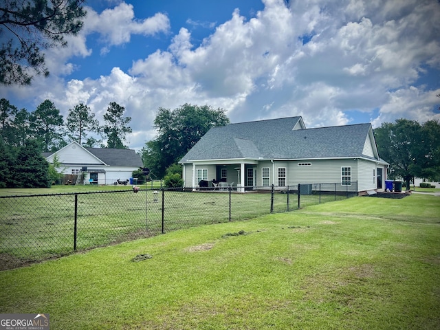 511 Live Oak Way, Dublin, GA 31021 - rear view of property with a shingled roof