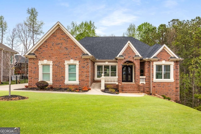 4457 Equity Ct, Ellenwood, GA 30294 - traditional home with brick siding, a front yard, and roof with shingles