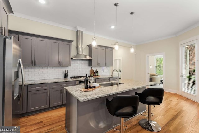 4457 Equity Ct, Ellenwood, GA 30294 - kitchen with wall chimney exhaust hood, stainless steel refrigerator with ice dispenser, a sink, backsplash, and gray cabinets