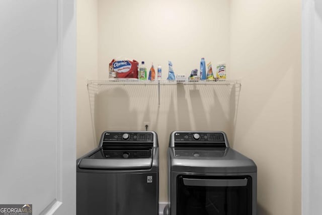 4457 Equity Ct, Ellenwood, GA 30294 - laundry room featuring washer and dryer