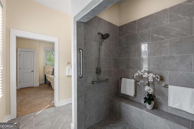 4457 Equity Ct, Ellenwood, GA 30294 - bathroom featuring connected bathroom, walk in shower, and baseboards